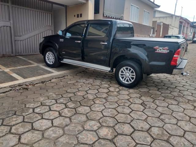 Hilux srv 3.0 completa automática aro 17 top de linha IPVA 2020 pago - Foto 6