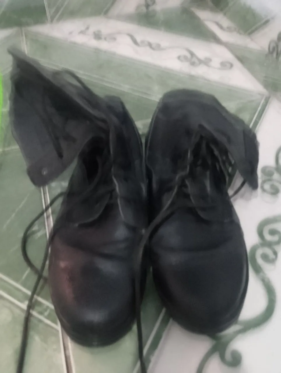 Botas de couro pretas