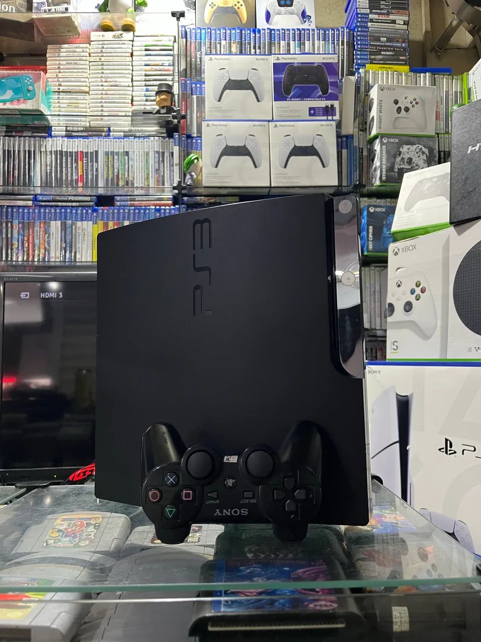 PS3 C/ vários jogos 