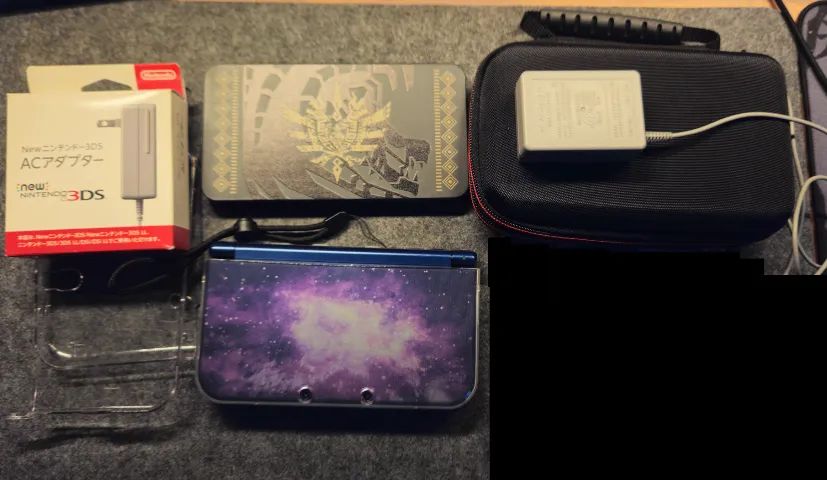 Nintendo New 3DS XL Galaxy - Bundle Acessórios