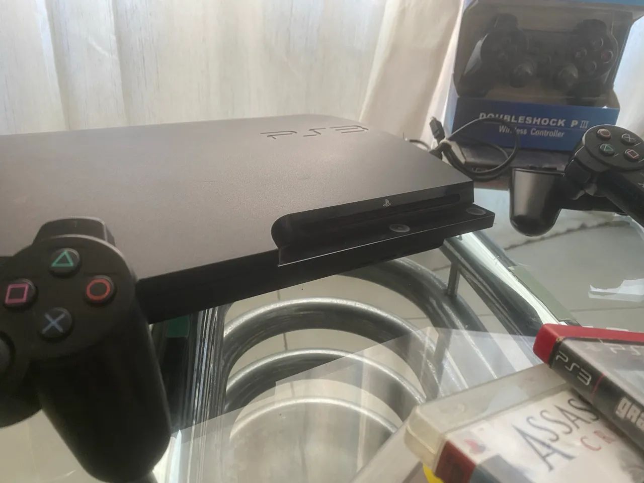 PS3 - com 7 jogos e 4 controles - Foto 2