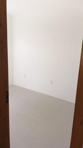 Casa terrea 2dorm 1suite C/estrutura segundo piso em otima localização - Foto 7