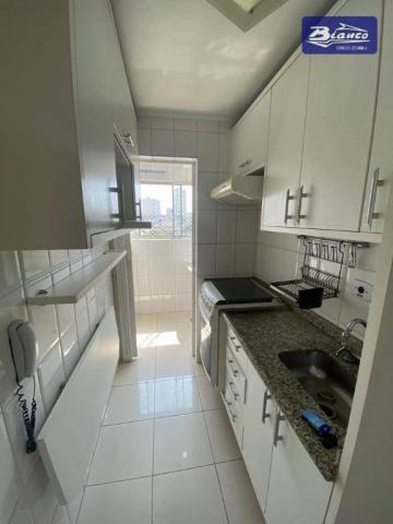Apartamento com 2 dormitórios para alugar, 50 m² por R$ 900,00/mês - Vila Augusta - Guarul - Foto 3