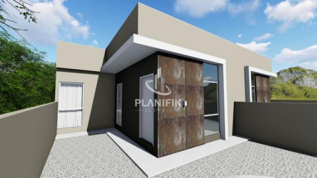 CASA COM 3 QUARTOS SENDO 1 SUÍTE BAIRRO AZAMBUJA - Foto 2