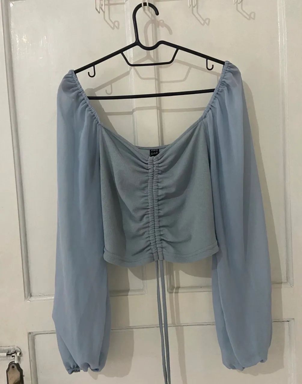 Blusa cropped mangas longas e bufantes - Foto 4