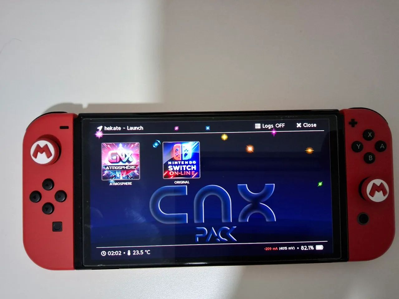 NINTENDO SWITCH OLED EDIÇÃO MARIO DESBLOQUEADO - SD 128GB + PRO CONTROLLER E ACESSÓRIOS  - Foto 4