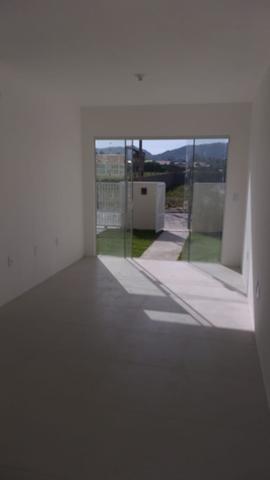 Casa terrea 2dorm 1suite C/estrutura segundo piso em otima localização - Foto 13