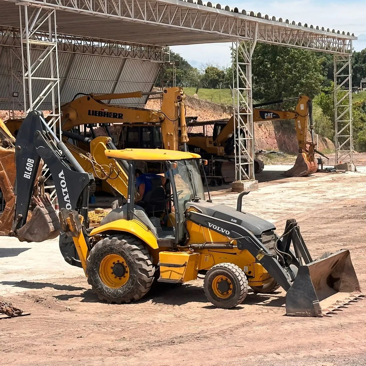 Retro escavadeira bl60 volvo e outras máquinas 