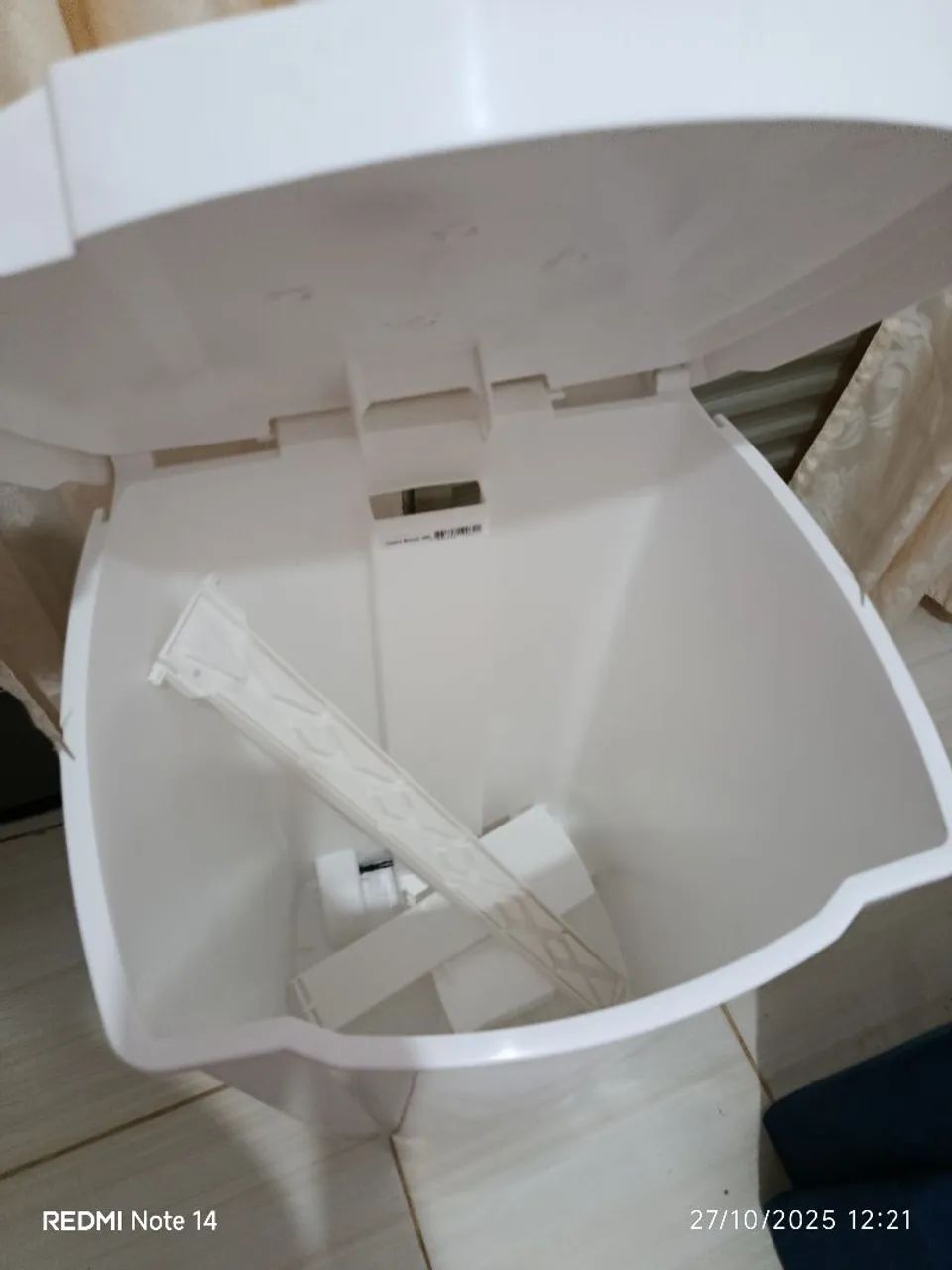 Selling a white 100-liter trash can for $260