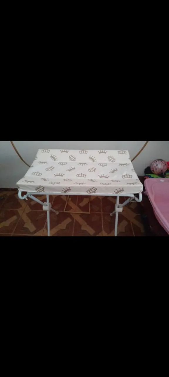 Trocador e para segurar a banheira 