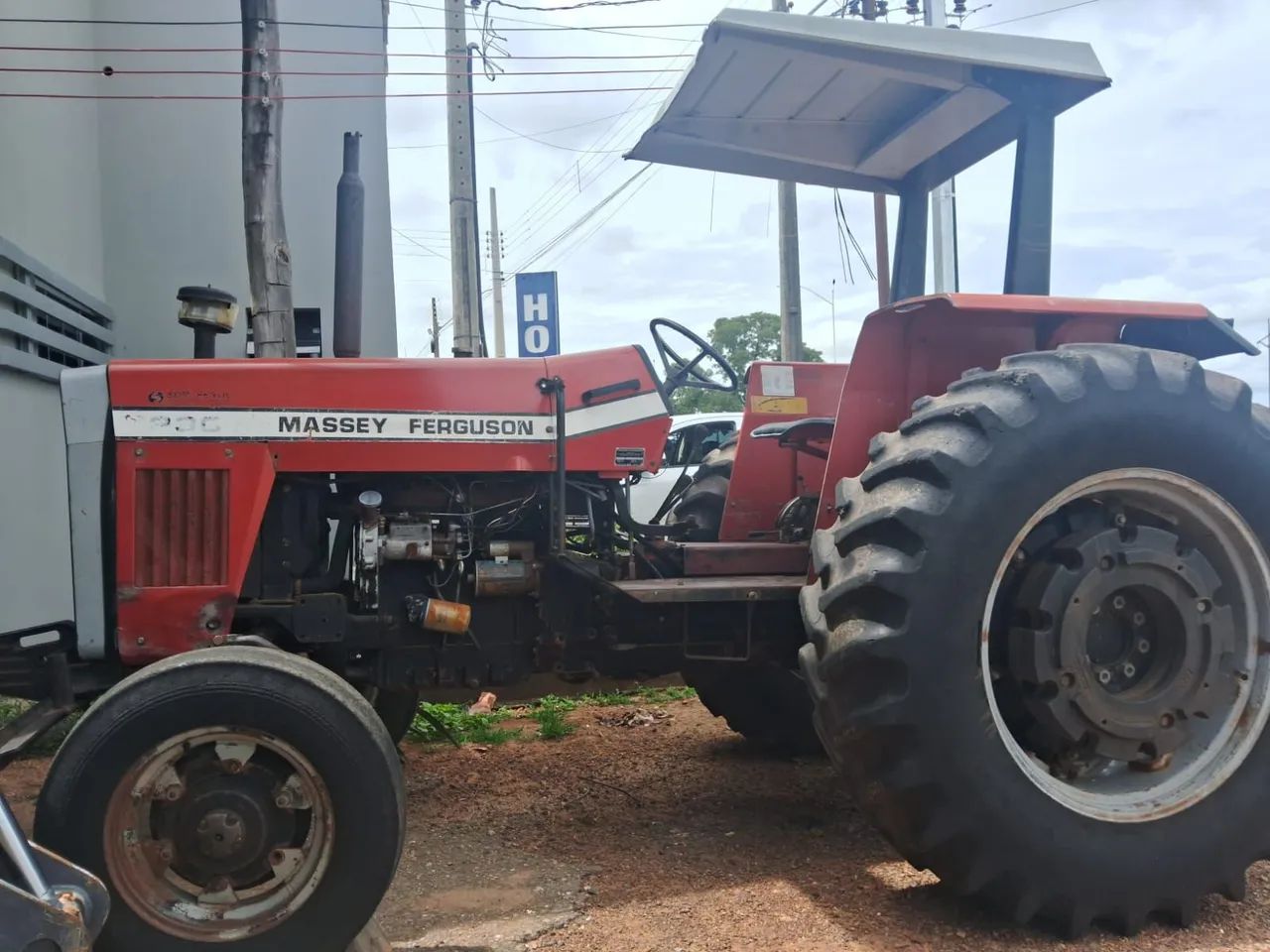 Trator massey Ferguson 290. uma grade 16 discos e um carretão