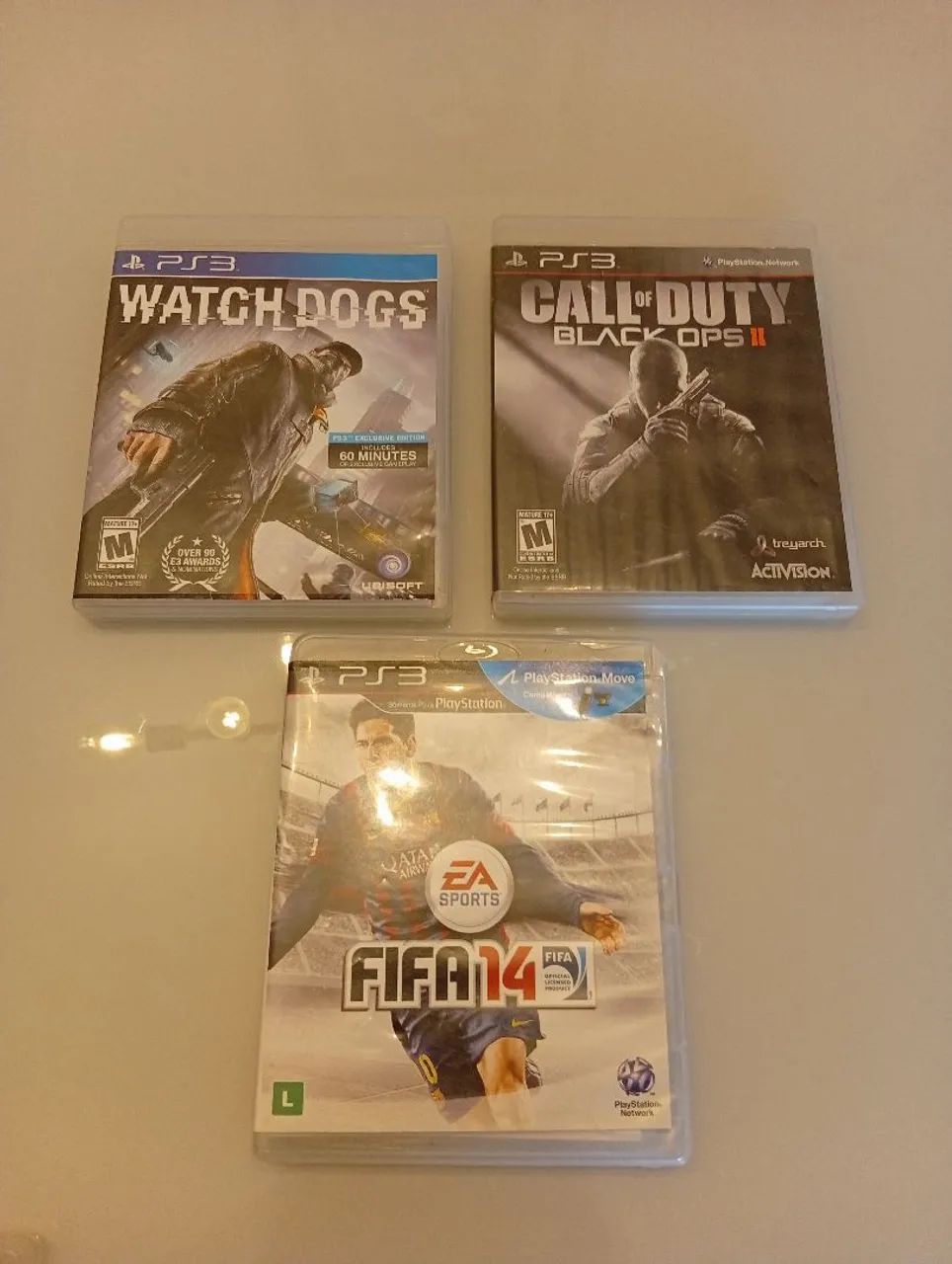 Três jogos de PS3 