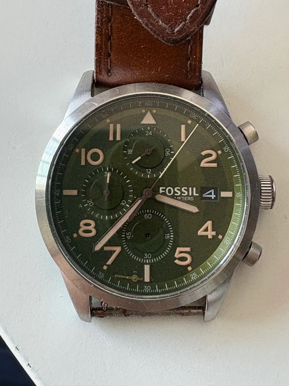 Relógio fóssil verde