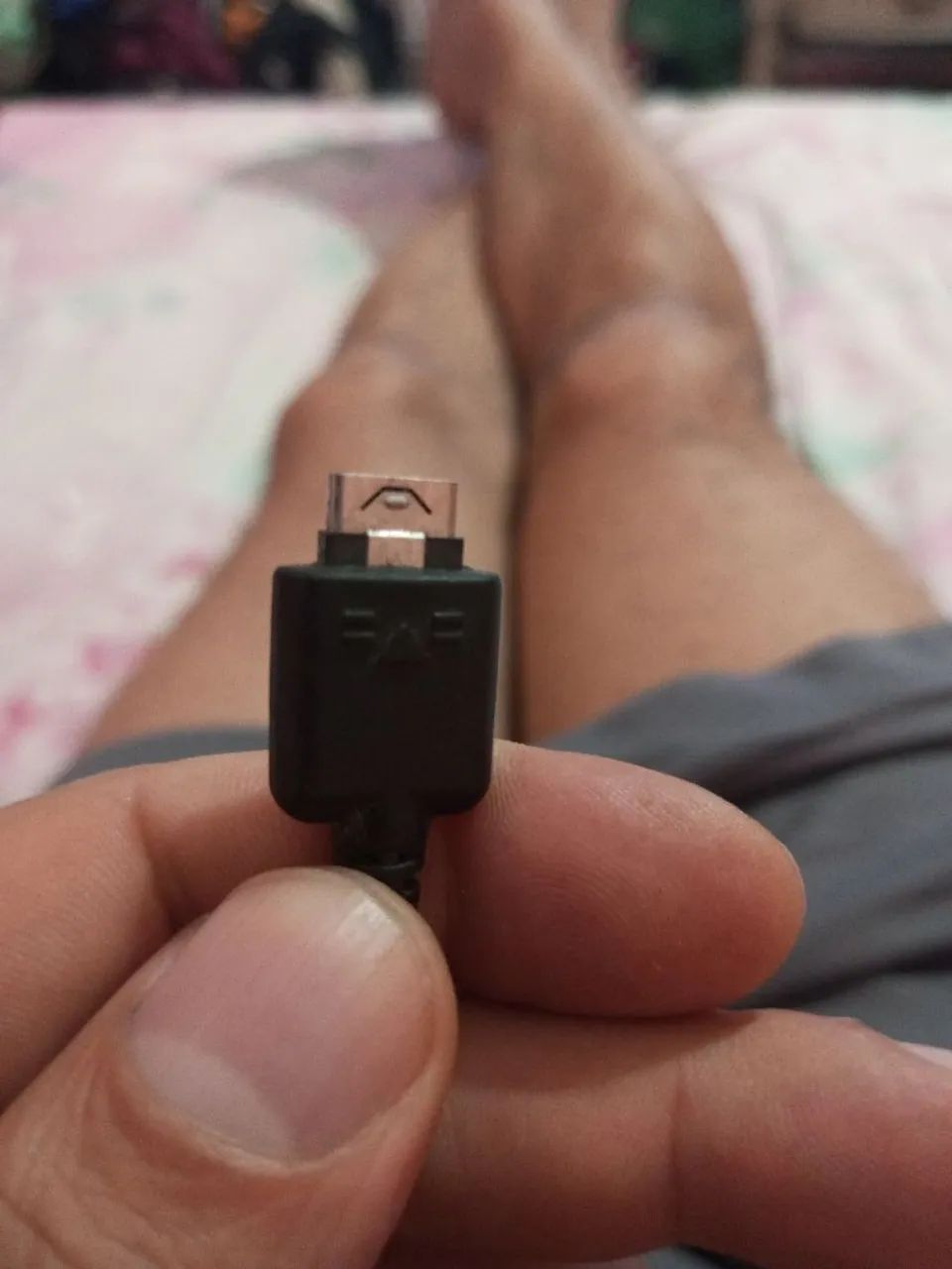 Carregador LG antigo.