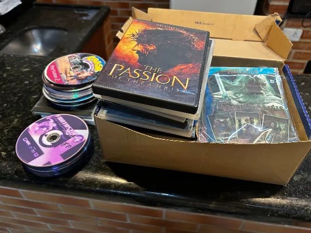 Jogos de ps2, pc e wii; dvds player e filmes