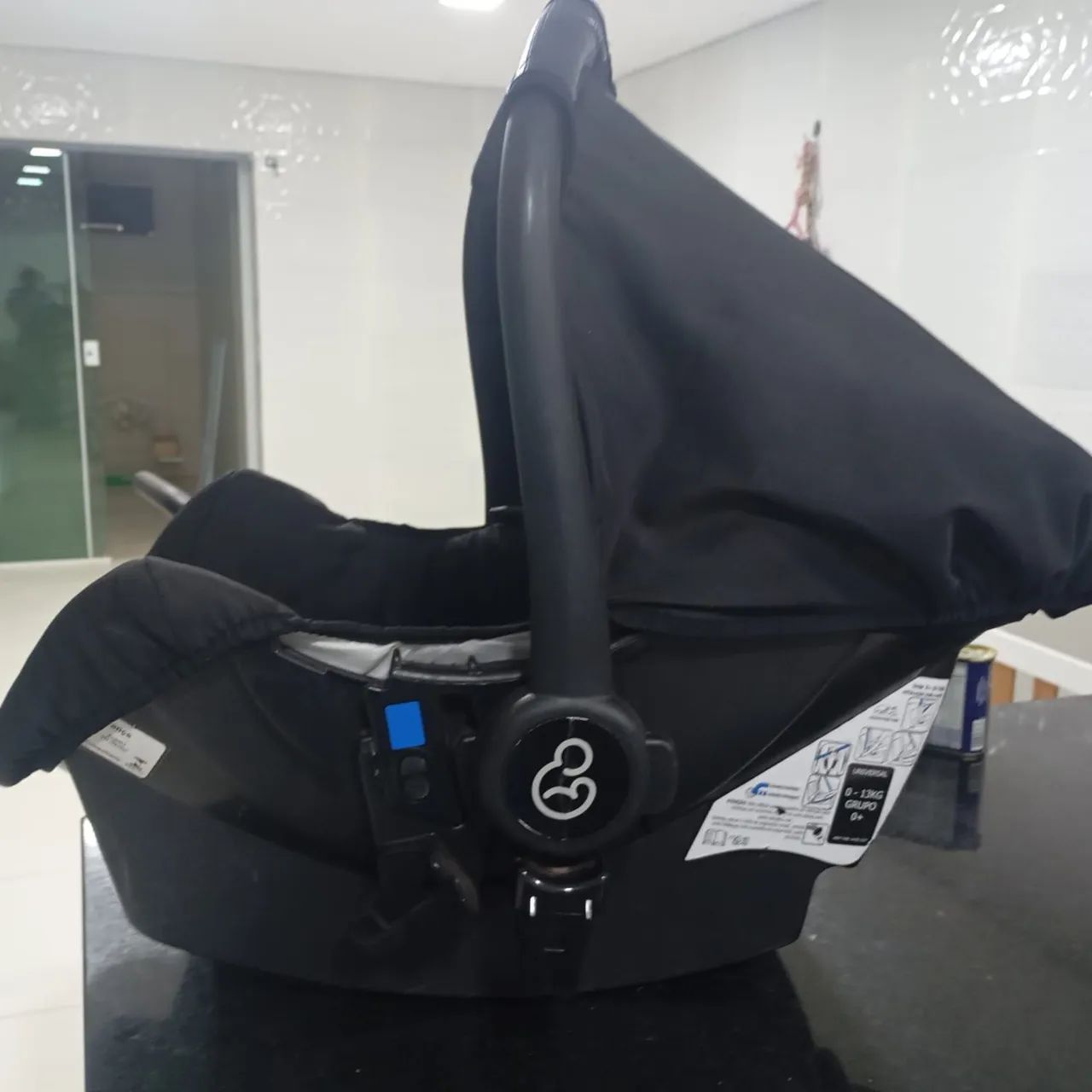Carrinho com bebê conforto 