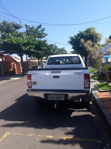 Vendo ou troco com urgência hilux 13/13 - Foto 6