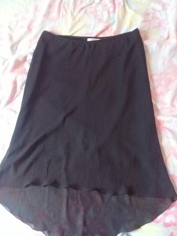 Vendo saias e vestidos usados mas em bom estado tanho outros além desses - Foto 4