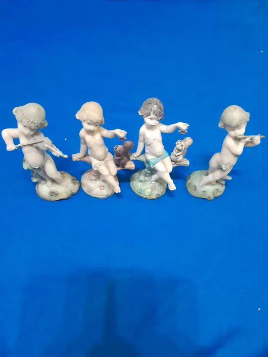 4 estátuas de anjinhos 