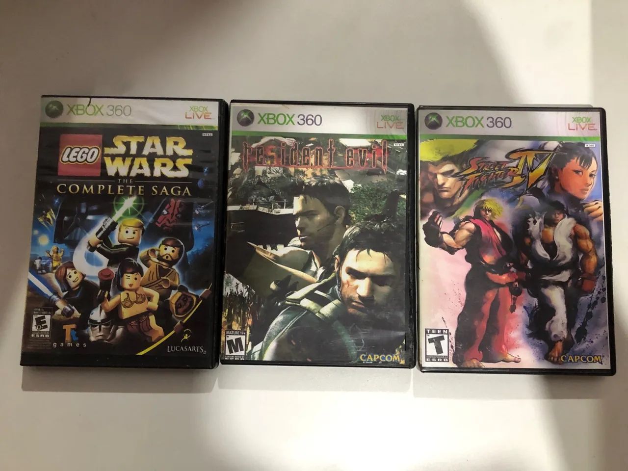 3 Jogos Xbox 360 - Lego Star Wars, Resident Evil e Street Fighter IV