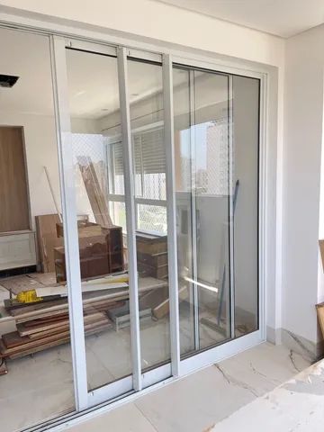 Porta de correr com 3 folhas, 3,30m largura, 2,25m altura, NOVA. - Foto 3