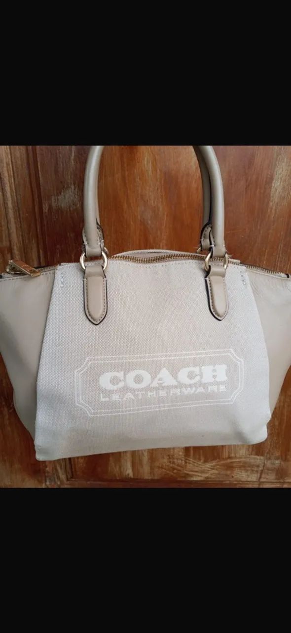 Bolsa coach original com código de veracidade 