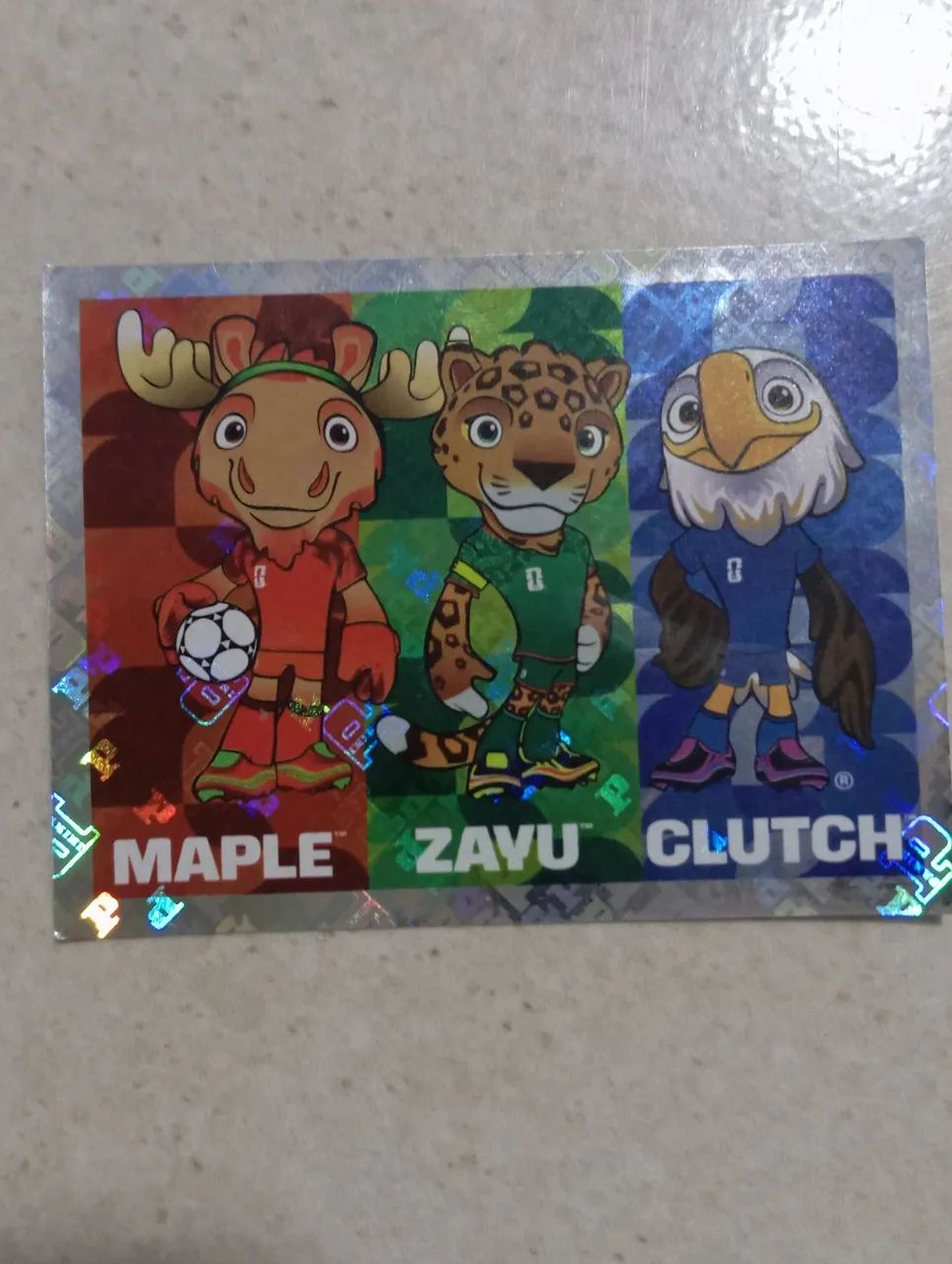 Vendo duas figurinhas, uma do Cristiano Ronaldo normal e dos três Mascote da Copa 2026 - Foto 3