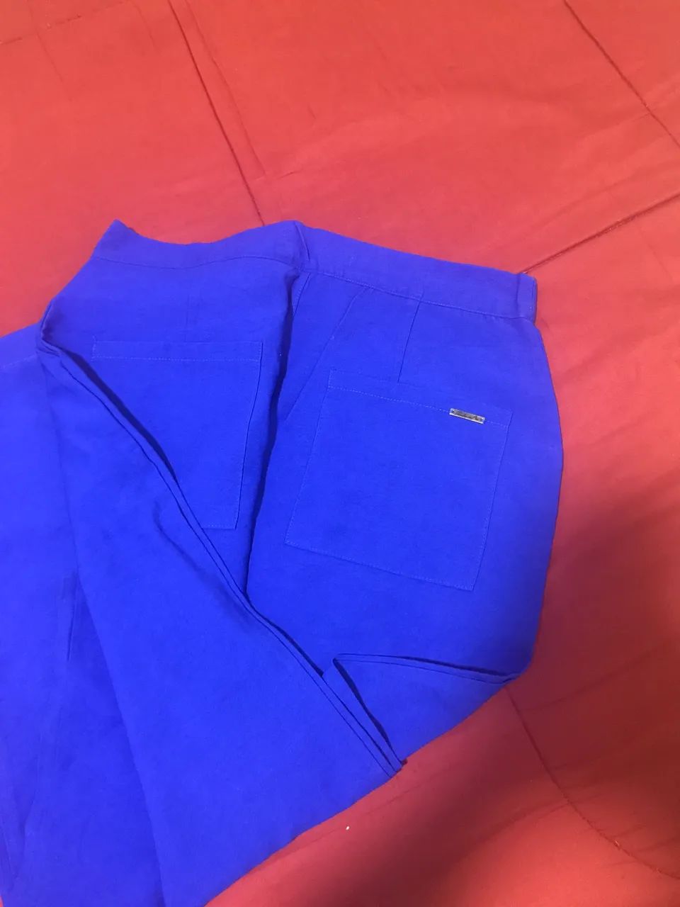 Pantalona azul/ parado no ar . - Foto 2