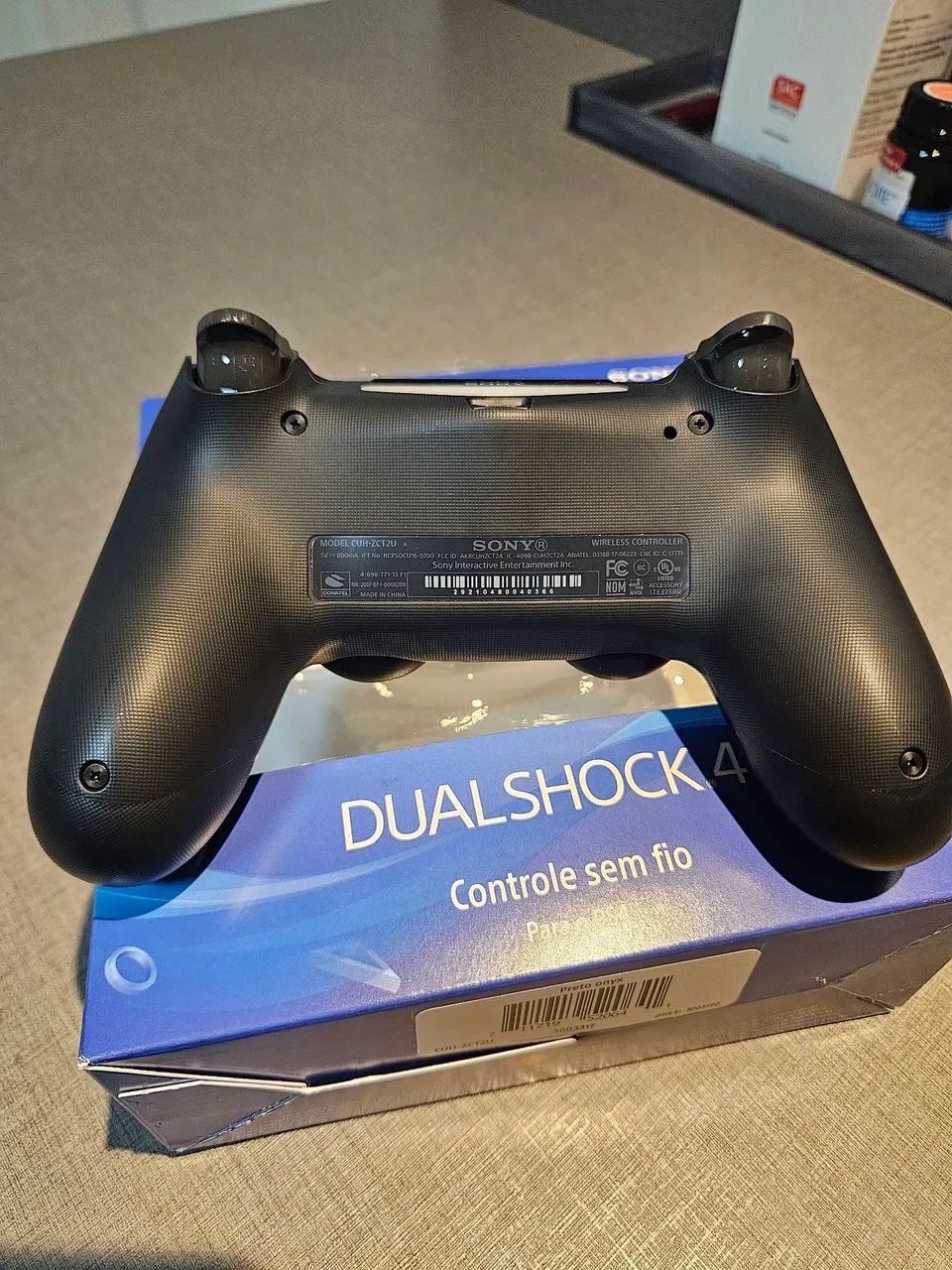 Controle DUALSHOCK 4 original na caixa - Foto 4