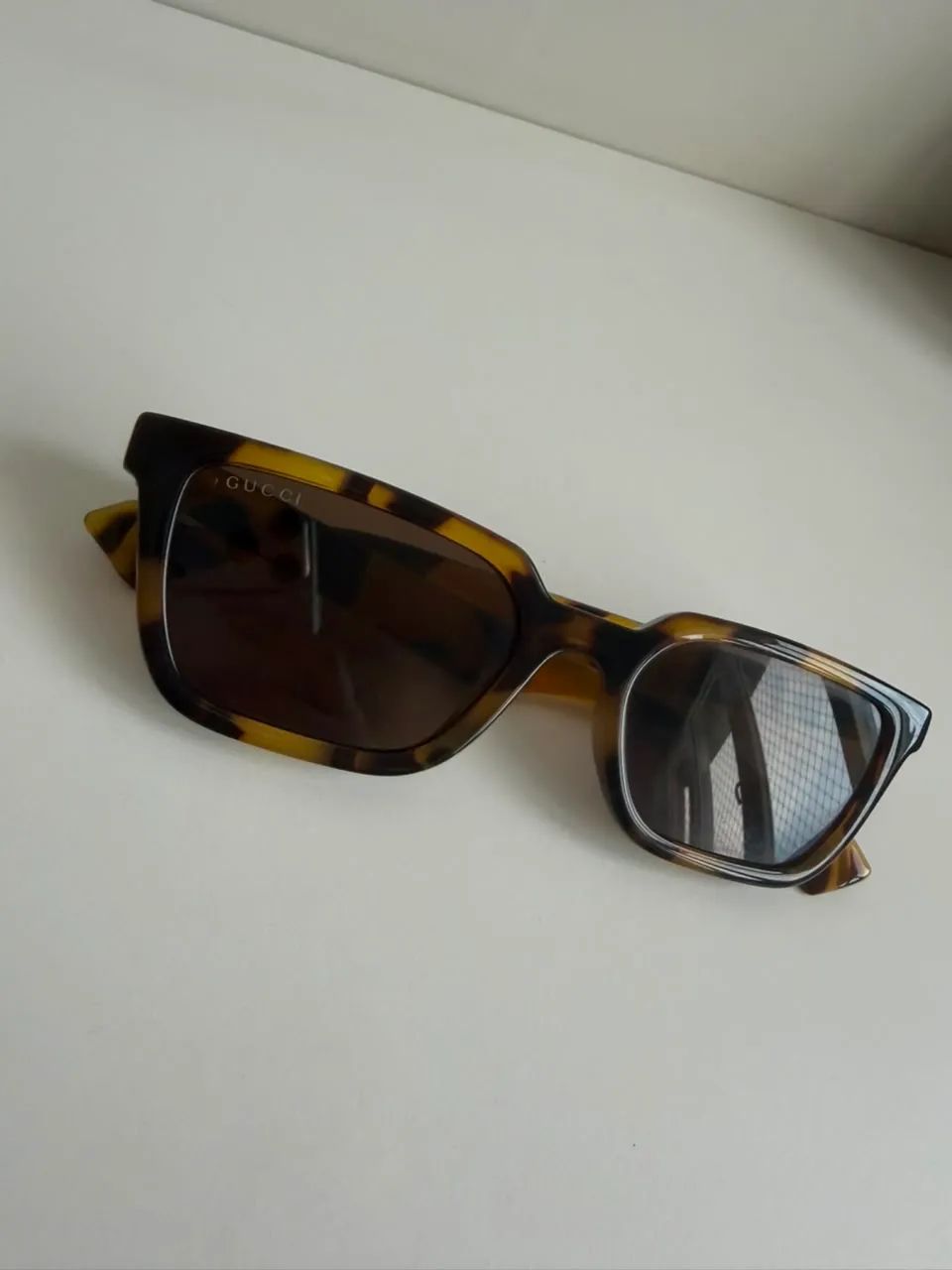 Óculos de sol Gucci tartarugado 