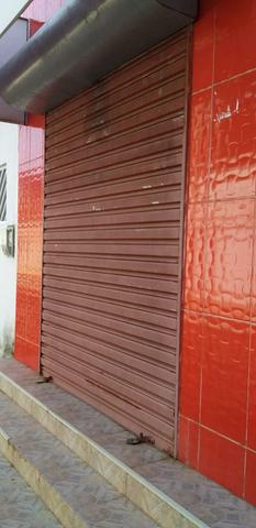Porta de vidro e portão de rolo