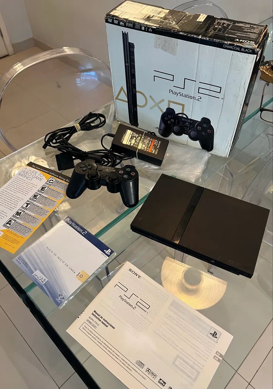 Playstation 2 com a caixa muito conservado 