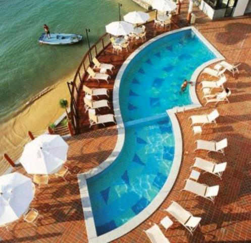Flat de luxo na beira mar 100% MOBILIADO