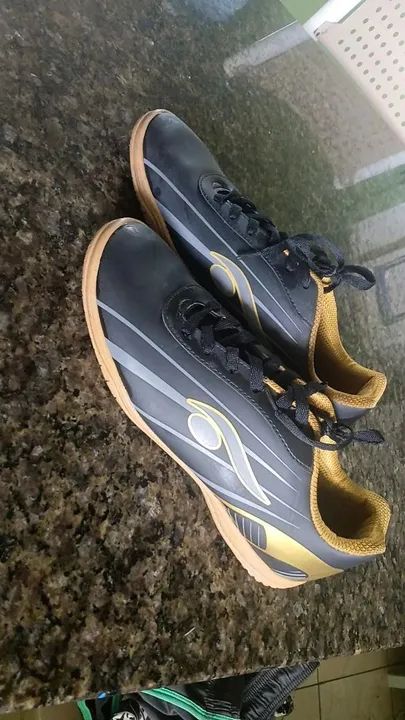 Chuteira dourada six