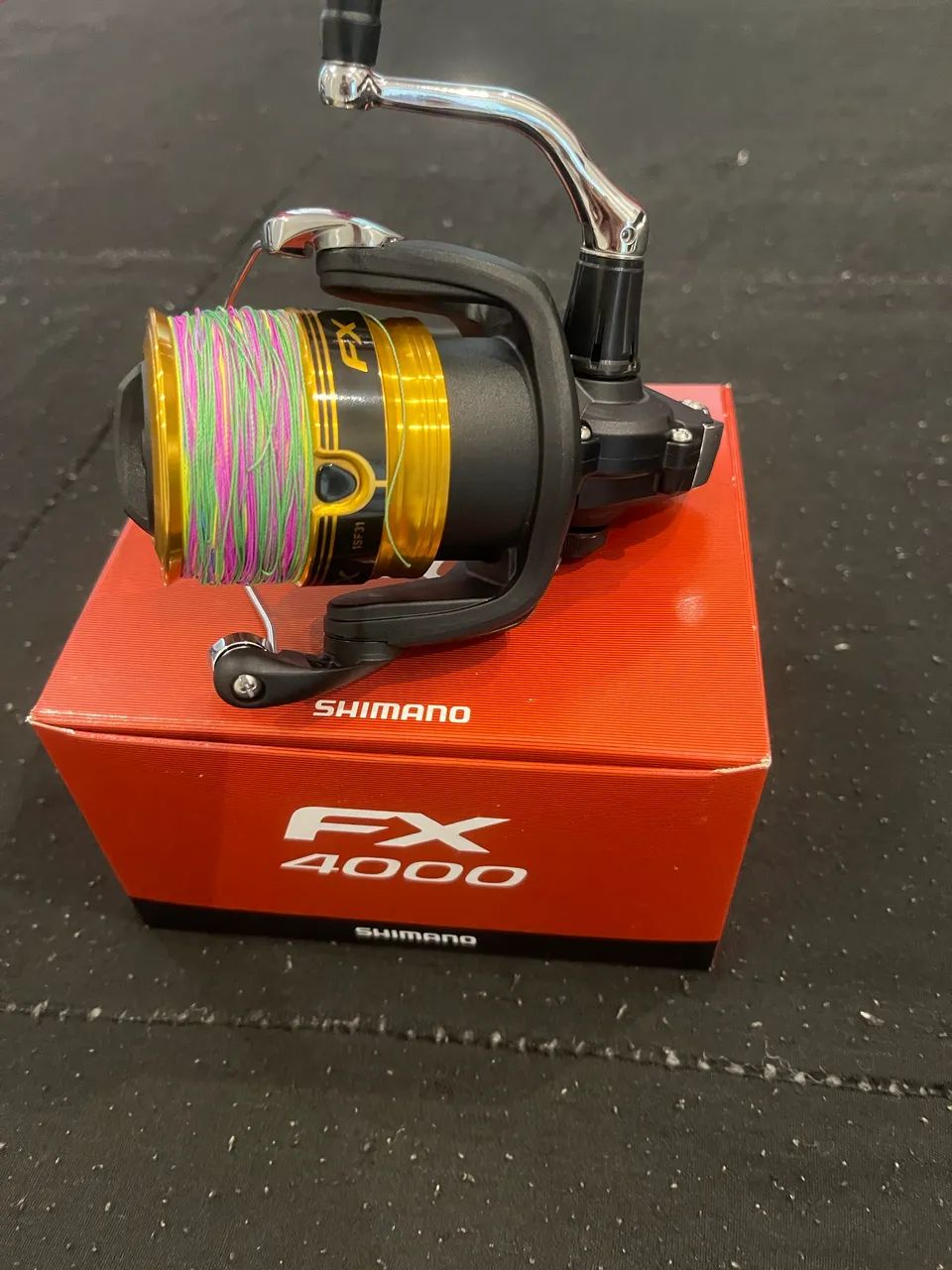 Molinete Shimano FX 4000 NOVO - Foto 5