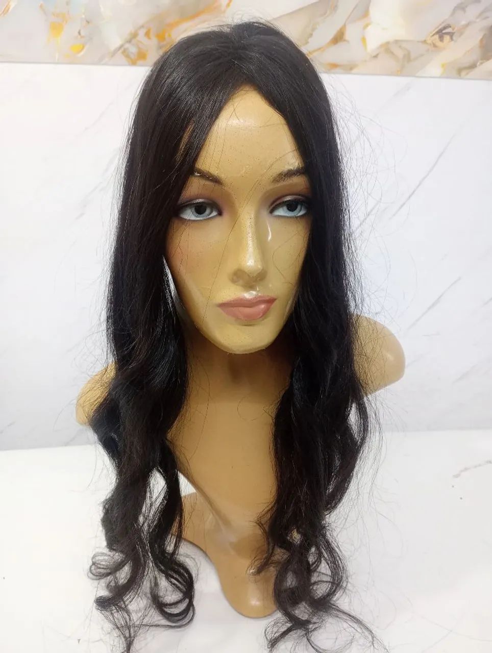 Prótese capilar fio a fio