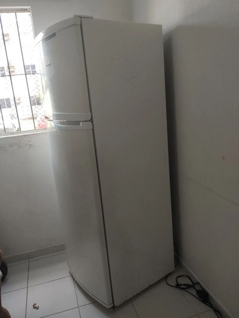Geladeira em perfeito estado, funcionando normal.