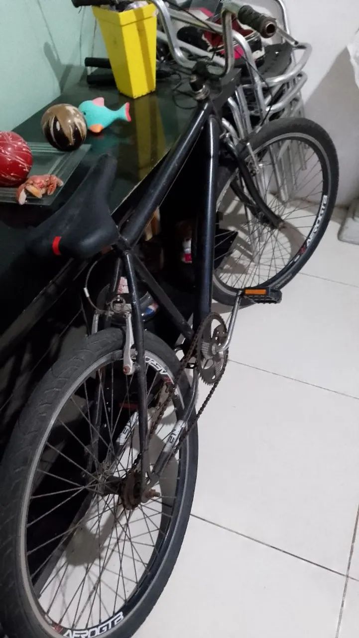 Vendo uma bicicleta ou troco em ps 2 vídeo game 