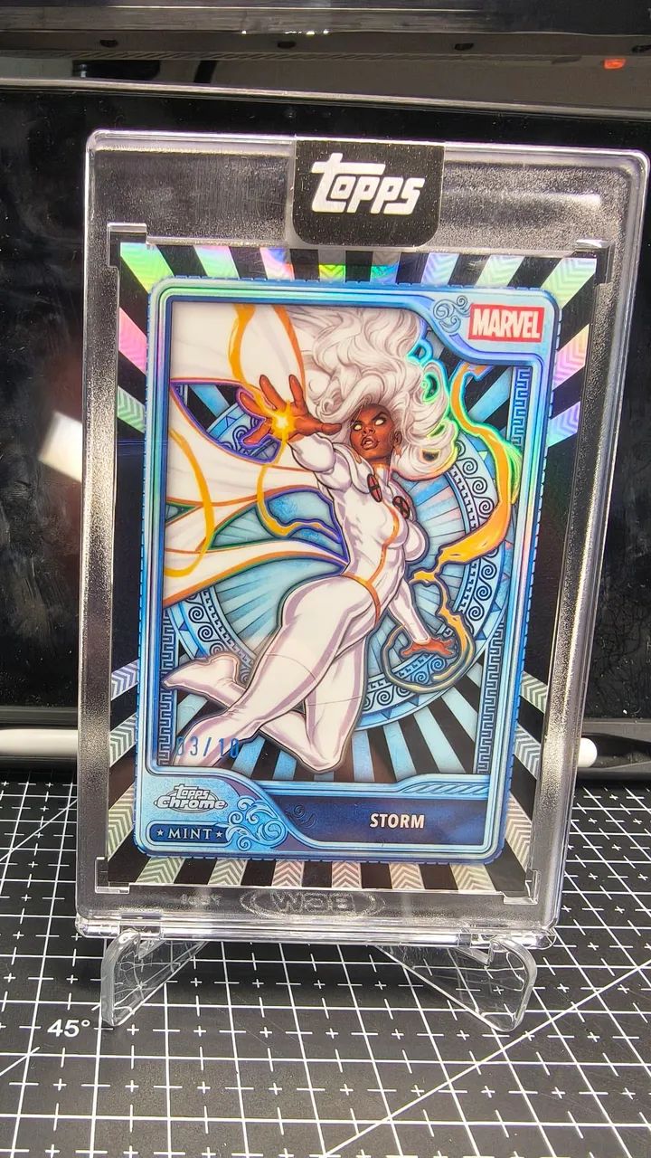 2026 Topps Mint Marvel Storm #107 Platinum Black /10 - 03/10 - Encapsulado Topps