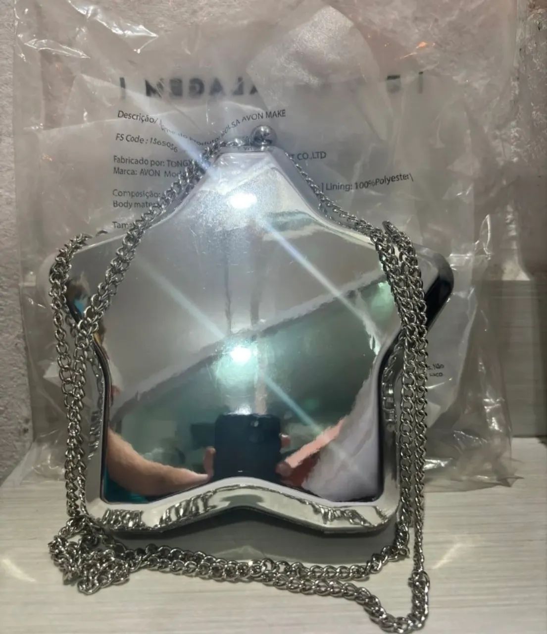 Bolsa estrela prateada da avon