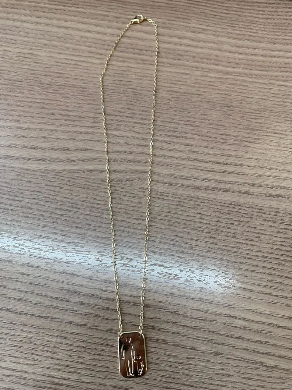 Corrente com temas de filhos folhada a ouro  - Foto 4