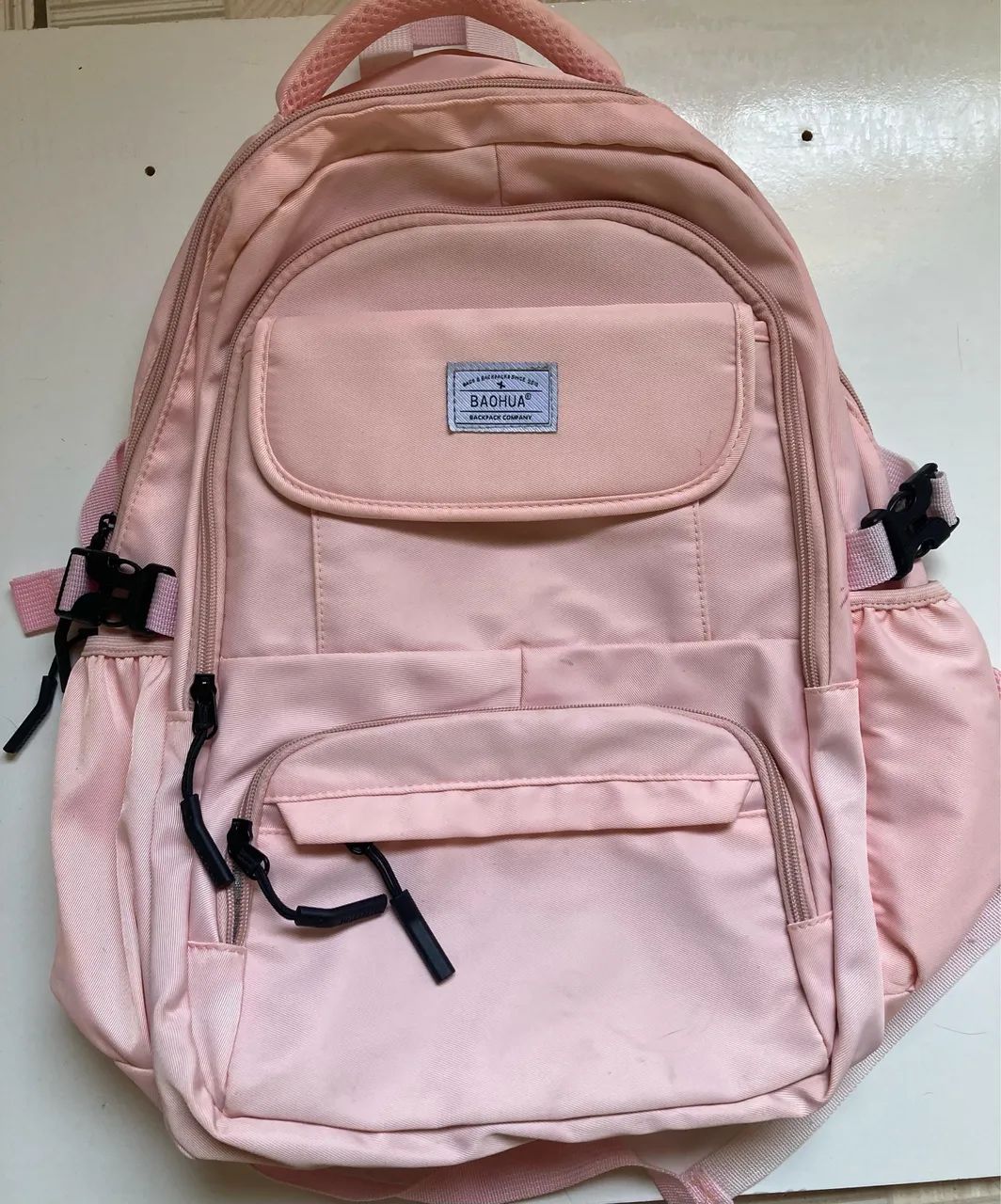 mochila rosa com espaço para notebook