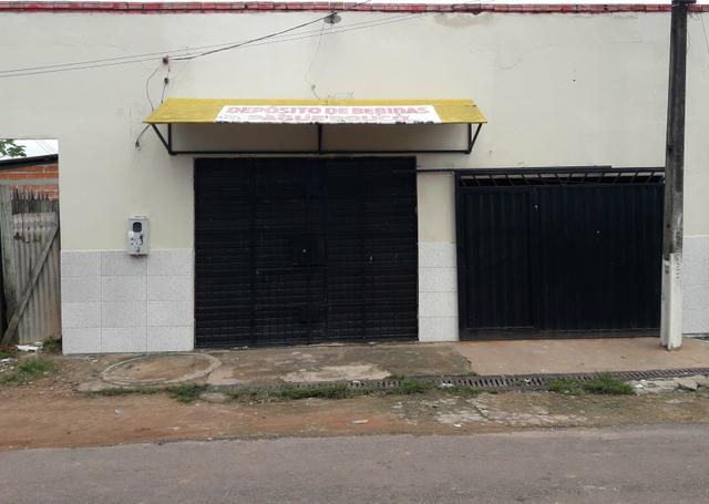 Casa e ponto comercial pela metade