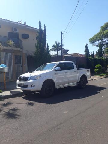 Vendo ou troco com urgência hilux 13/13