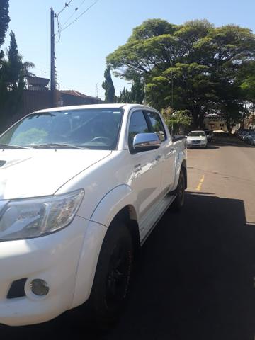 Vendo ou troco com urgência hilux 13/13 - Foto 5