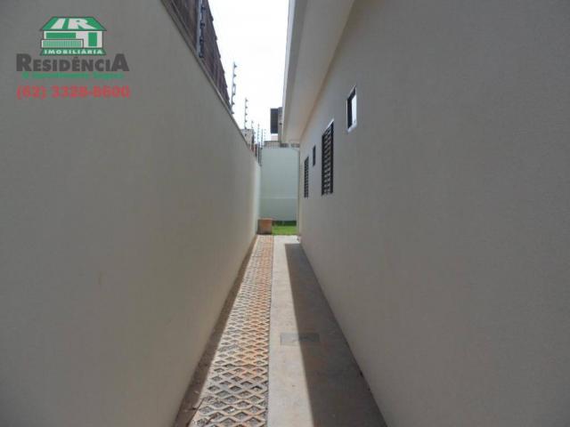 Casa com 3 dormitórios para alugar, 117 m² por R$ 1.100,00/mês - Residencial Flamboyant - - Foto 2