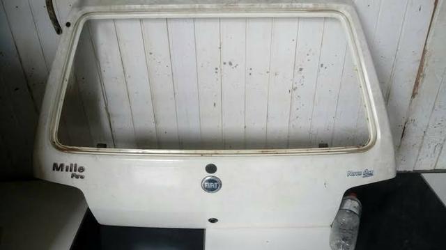Porta /Tampa Traseira (Mala) p/ Fiat Uno Fire a partir de 2004 / Original