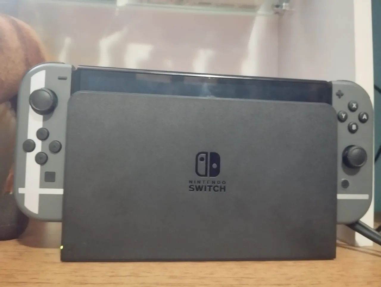 Nintendo Switch OLED + Super Smash Bros Ultimate+ Mário Odyssey físico. - Foto 5
