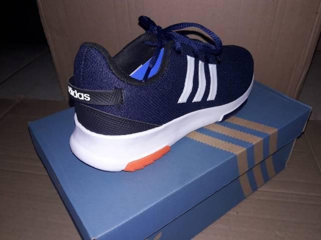 tenis adidas masculino azul e laranja