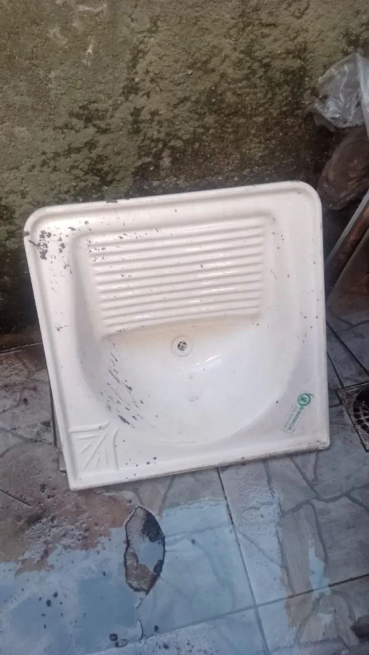Tá que de lavar roupa de mármore